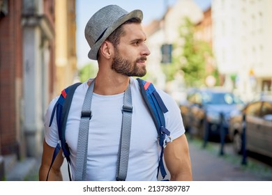 Closeup Portrait Of Young Man Exploring European City During Summer Vacations