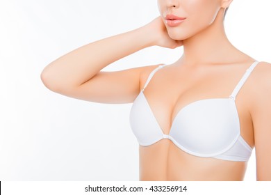 Closeup portrait of young sexy woman in white bra