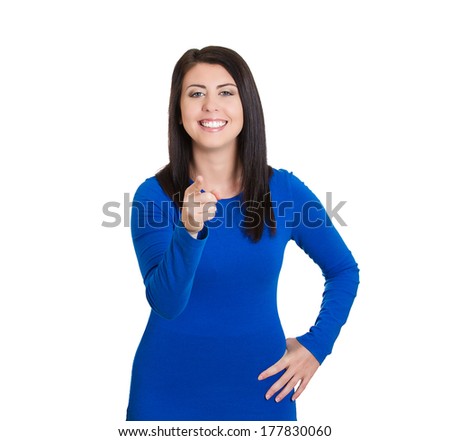 Closeup portrait of young smiling pretty woman pointing at you camera gesture or pushing button, isolated on white background. Positive human emotion facial expression feelings, signs and symbols