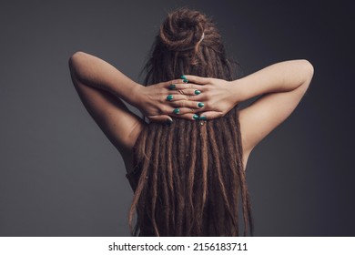 Closeup Portrait Of Young  Woman,  Dreadlocks And Long Hair￼ Back View