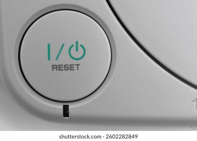 Closeup of the power button on the game console