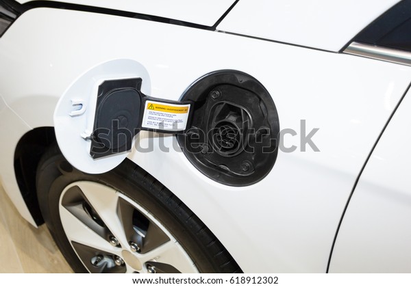 Closeup of power Plug for\
electric car