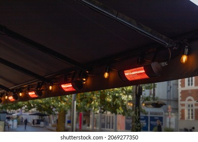 Close-up Of Powered Patio Heater Outdoors Of A Restaurant, Concept For Negative Carbon Footprint