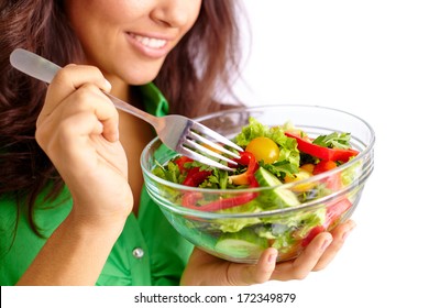 Close-up Of Pretty Girl Eating Fresh Vegetable Salad