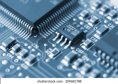 Closeup of a printed circuit board with components such as integrated circuits