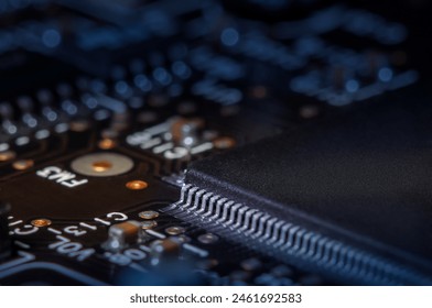 Closeup of Printed Circuit Board with processor, integrated circuits and many other surface mounted passive electrical components. - Powered by Shutterstock - Get 15% off with code: PIKWIZARD15