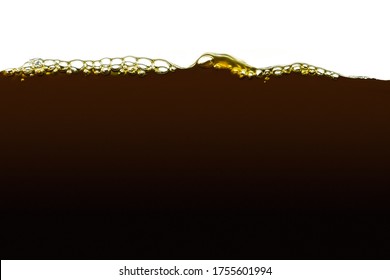 Closeup Process Of Pouring Ice Coffee, Espresso. Macro Shot Of Black, Brown Liquid In Transparent Glass. Abstract Background With Waves, Bubbles. Cold Beverages, Cocktails, Hot Drinks Concept.