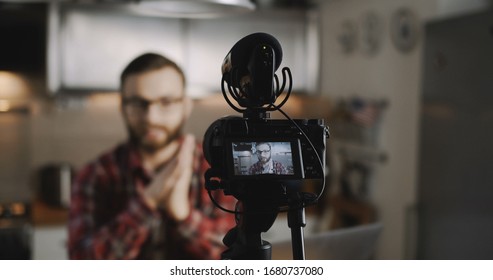 Close-up Professional Camera Filming Happy Young Social Media Blogger Man, Making Videos For Vlog Slow Motion.