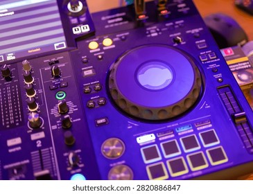 Close-up of professional DJ mixing controller