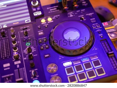 Close-up of professional DJ mixing controller