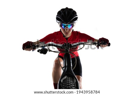 Close-up professional female cyclist young woman with road bike bicycle posing isolated on white background. Helmet, goggles and gloves. Concept of sport, acton, motion, speed, race. Copy space for ad