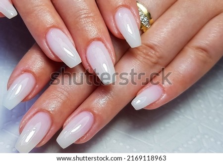 a close-up with a professional gel manicure