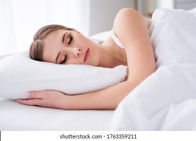 Closeup Profile Photo Of Charming House Wife Young Lady Lying Sheets Bed Covered Blanket Hold Hand Under Pillow Eyes Closed Weekend Saturday Morning Quarantine Wear Pajama Room Indoors