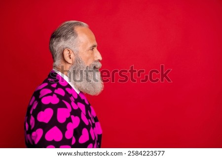 Close-up profile side view of his he nice attractive serious content focused white-haired man wearing heart pattern blazer isolated on bright vivid shine vibrant red color background