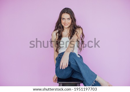 Close-up profile side view portrait of her she nice-looking attractive lovable fascinating magnificent winsome cheerful wavy-haired girl isolated over violet pastel background