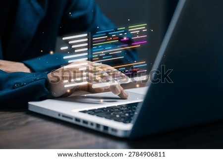 Closeup of programmer typing on laptop with colorful coding interface, software development, programming language, web application and digital technology concept.