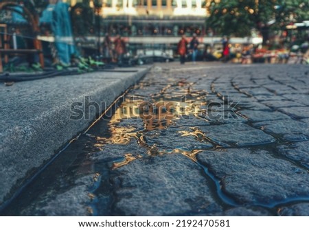 close-up of puddle on street