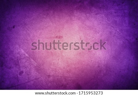 Closeup of purple textured concrete background. Dark edges  