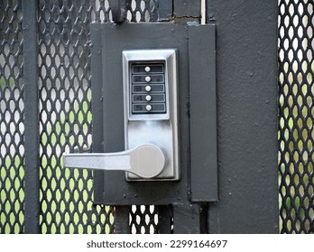 Closeup of a push button security lock at a complex