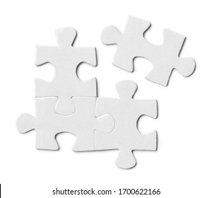 Close-up Of Puzzle Pieces, Isolated On White Background