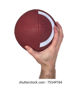 Closeup Of A Quarterback's Hand While Throwing A Football