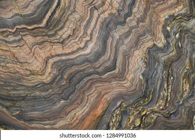 Closeup quartzite stone with natural pattern texture background.