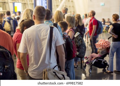 Closeup Queue Of Europen People Waiting At Boarding Gate At Airport