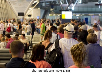 Closeup Queue Of Europen People Waiting At Boarding Gate At Airport