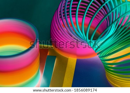 Closeup of rainbow spring toy background