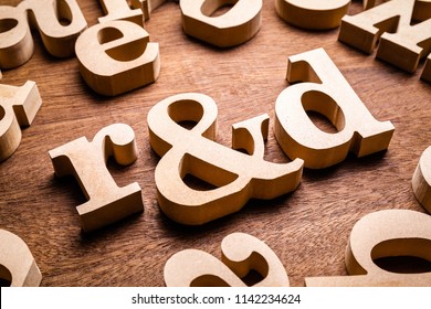 Closeup R&D (Research and Development) wood letters in the group of English alphabet