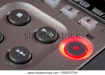 Closeup of record button on audio recorder