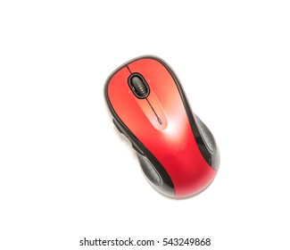 Close-up Red And Black Wireless Mouse In Contoured Shape Isolated On White Background. Modern Computer Mouse With Soft Rubber Grips, Back-forward And Side To Side Scrolling Buttons.  Top View.