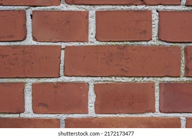 Closeup Of A Red Brick Wall Of A House Or Home. Background Of Clean, Modern, Rustic, Building And Masonry. Historic Housing Design For Detail And Concept Of An Urban Structure Outside With Copyspace