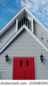 Closeup of red church door of St. John’s episcopal church Westwood MA USA