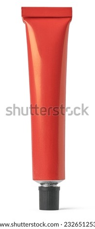 close-up of red color tube with black cap, mock-up template for toothpaste, glue, cream, gel or shampoo, blank package isolated on white background, medicine or cosmetics concept