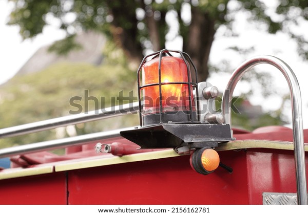 Close-up of red\
emergency light of fire\
engine