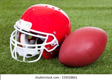 Close-up Of A Red Football Helmet On Field