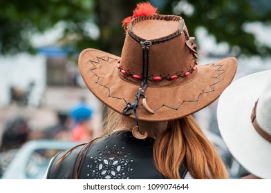 Closeup Of Red Head Woman With Brown Cow Girl Hat 