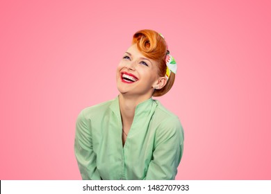 Closeup Red Head Young Woman Pretty Pinup Girl Green Button Shirt Laughing Smiling Looking Up Isolated On Pink Background Retro Vintage 50's Style. Human Emotions Body Language