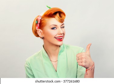 Closeup Red Head Young Woman Pretty Pinup Girl Green Button Shirt Giving Thumbs Up Sign Gesture Looking At You Camera Isolated White Background Retro Vintage 50's Style. Human Emotions Body Language