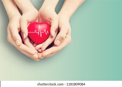 Close-up red Heart in hands, love concept - Shutterstock ID 1181809084