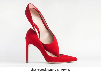 Closeup Red High Heels On White Stock Photo (Edit Now) 1674069481