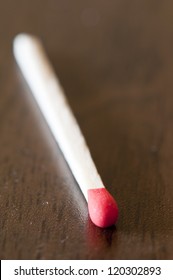 Close-up of a red match on the table - Shutterstock ID 120302893