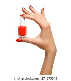 Closeup Of Red Nail Polish In The Hand Of