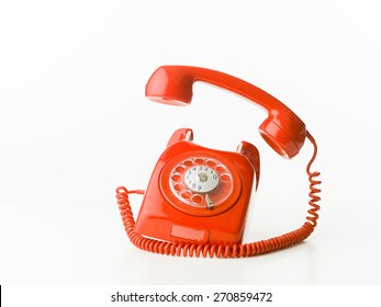 Closeup Of Red Vintage Phone Ringing, Isolated On White Background