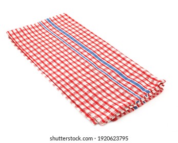 Closeup of red and white checkered fabric or napkin isolated on white background. Concept kitchen utensils and tableware.