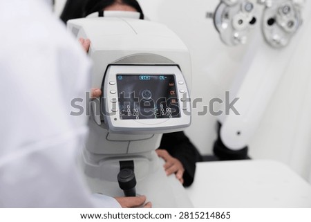 Close-up, refractometer device screen, patient eye exam, vision and eyesight improvement by expert optometrist, diagnostic for eyeglasses lens, professional technology services in optical clinic.