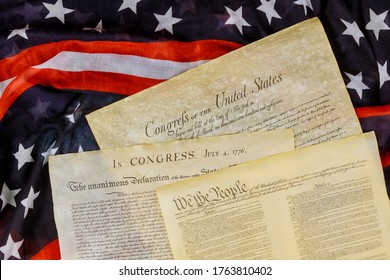 Closeup of a replica of U.S. document of American constitution We the people with USA Flag. - Powered by Shutterstock