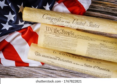 Closeup of a replica of U.S. document of American constitution We the people with USA Flag. - Powered by Shutterstock