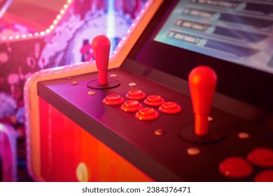 Close-up of retro arcade joystick and buttons, vibrant colors and details of a classic gaming machine, entertainment and gaming concept